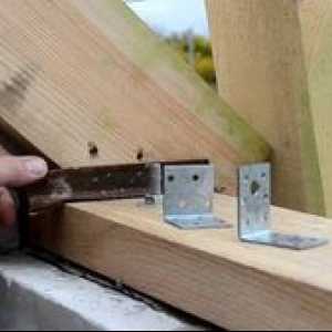 Kovové perforované spojovacie prvky pre drevené konštrukcie